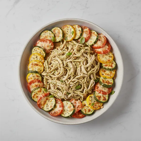 Spatchcocked Pesto Chicken with Cheesy Vegetable Coins